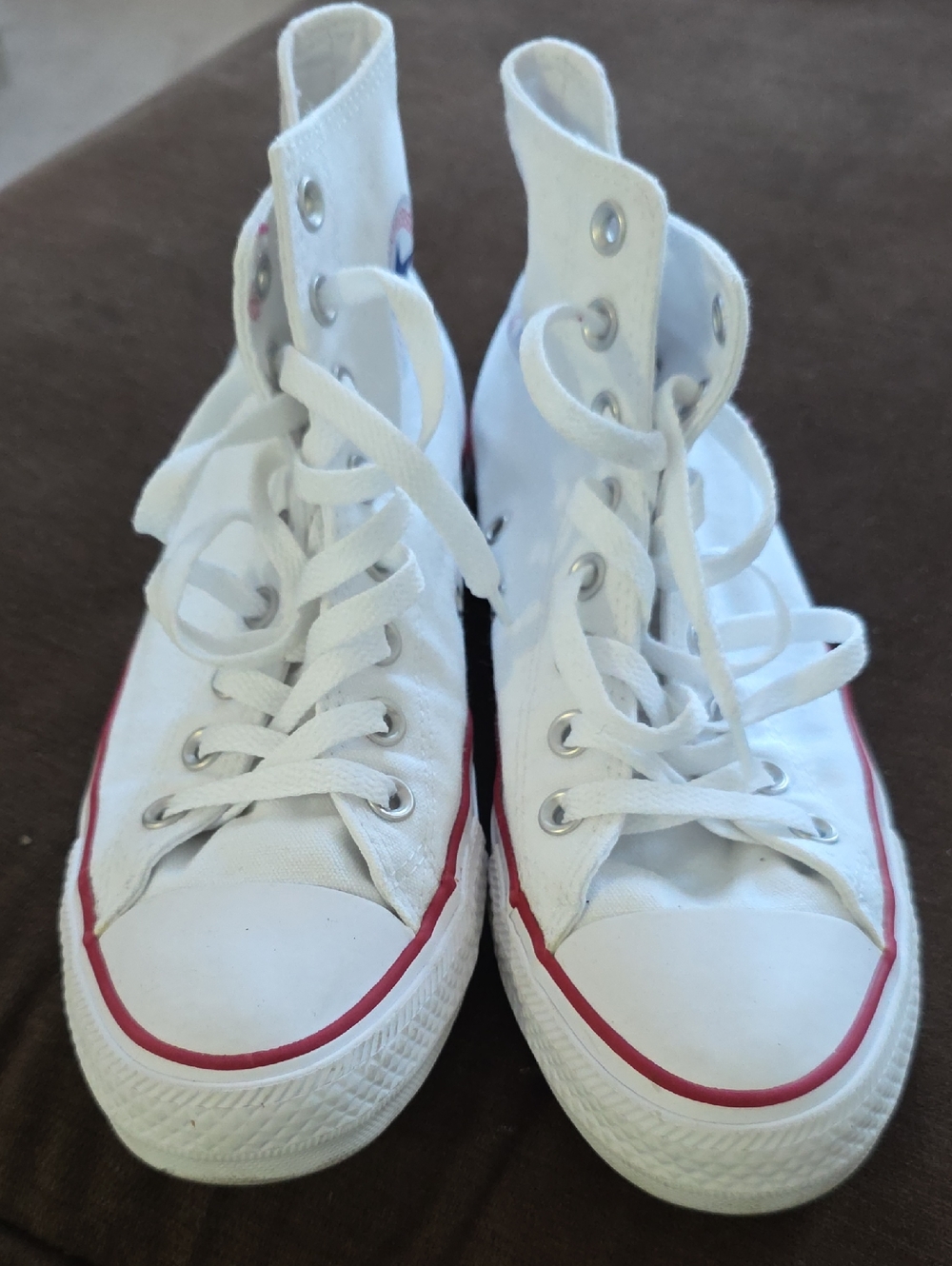 Converse White High-Top Sneakers with Red Stripe